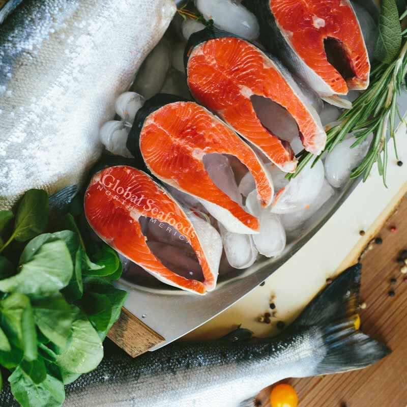 Miso-marinated sockeye salmon fillet baked golden with sesame seeds and green onion garnish