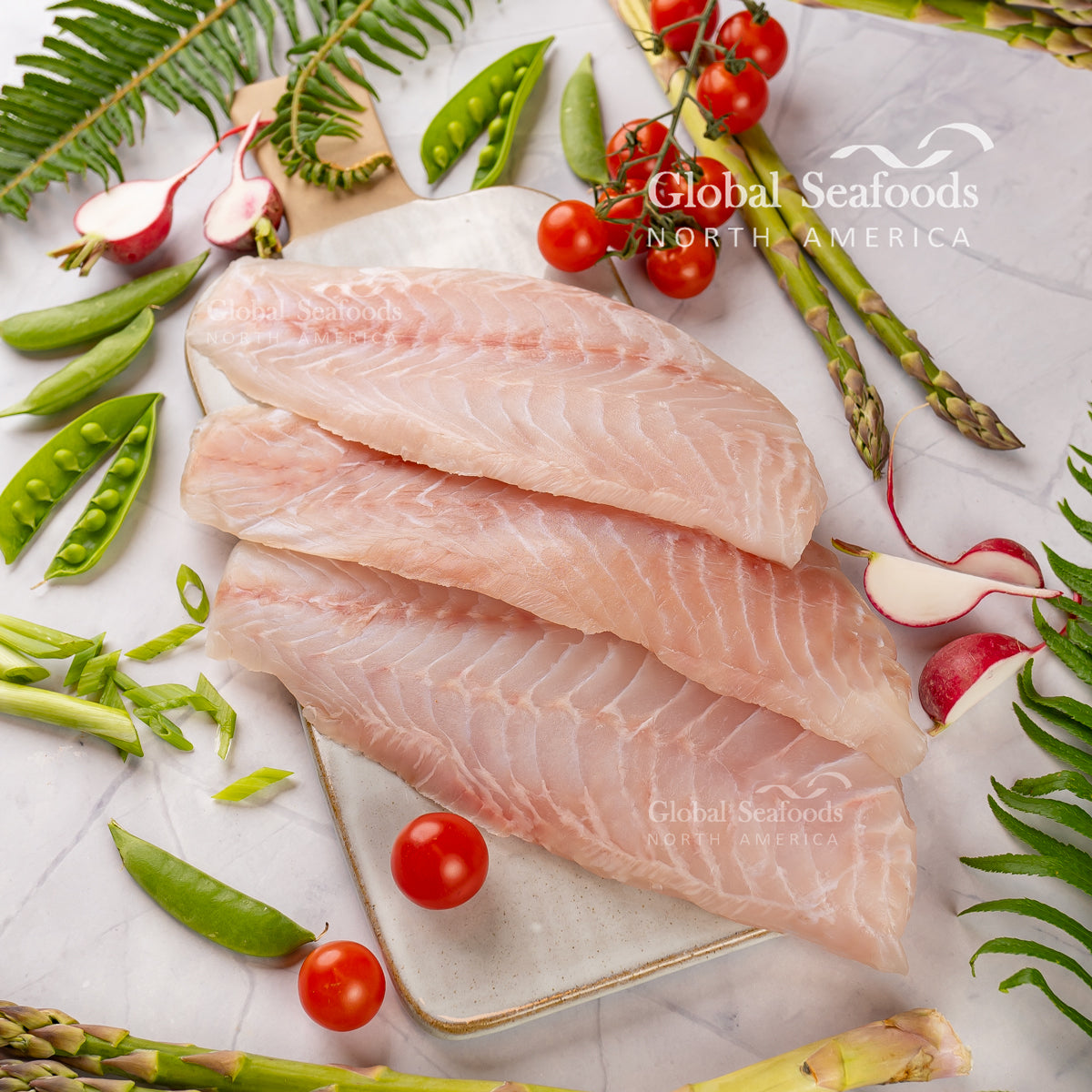 Raw wild-caught grouper fillets prepared for cooking