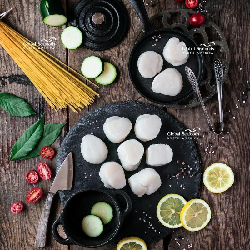 Fully cooked sea scallops on a plate — a safe, low-mercury, high-protein seafood choice for pregnant women when prepared properly and cooked to 145°F internal temperature