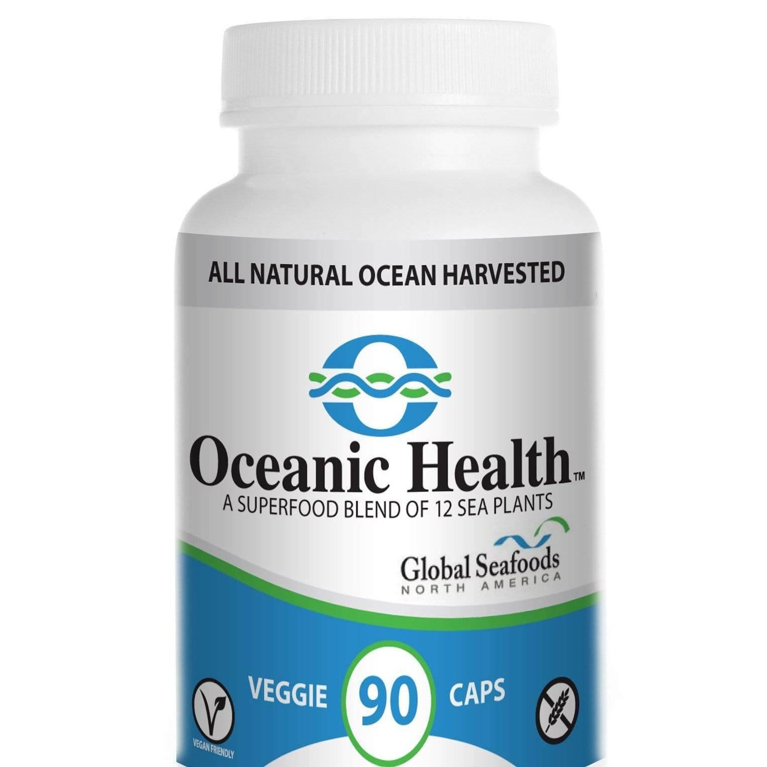 Seaweed supplement capsules and dried kelp on a white surface