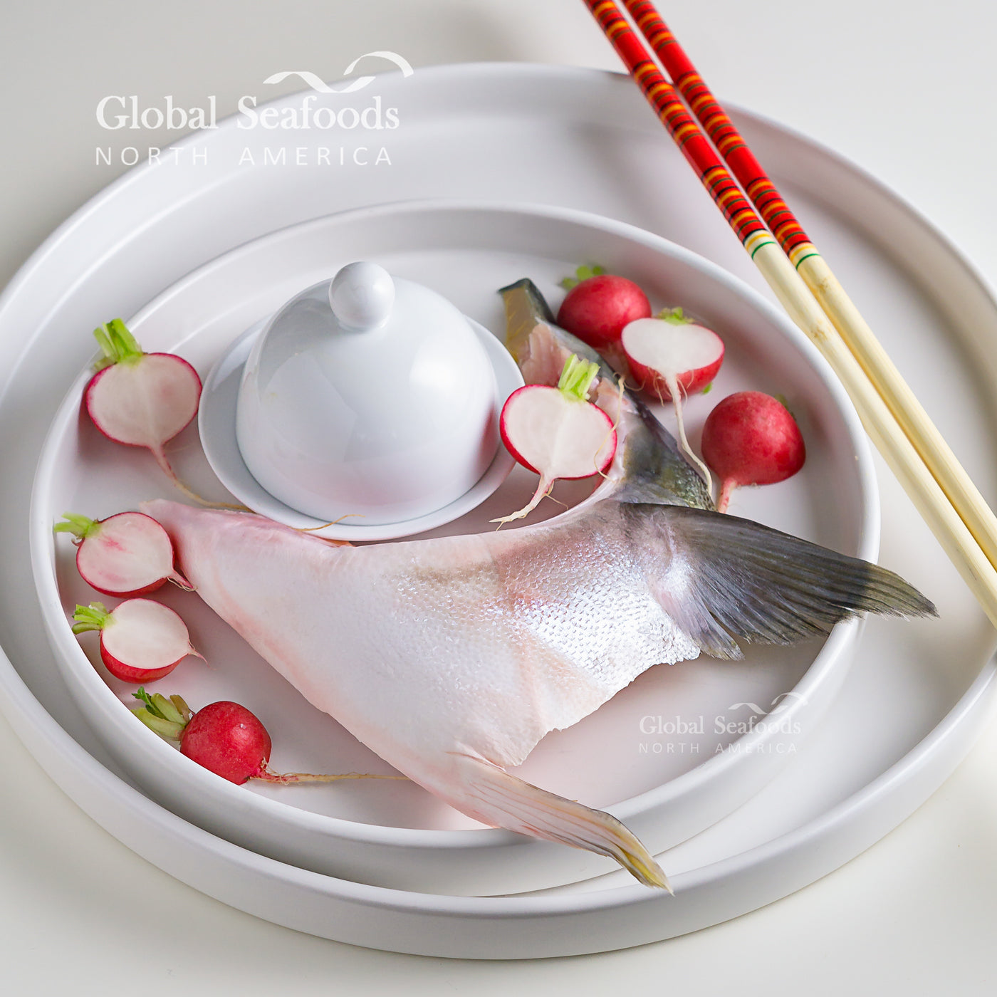 Fresh Hamachi Kama yellowtail collar seasoned with sea salt, ready for grilling