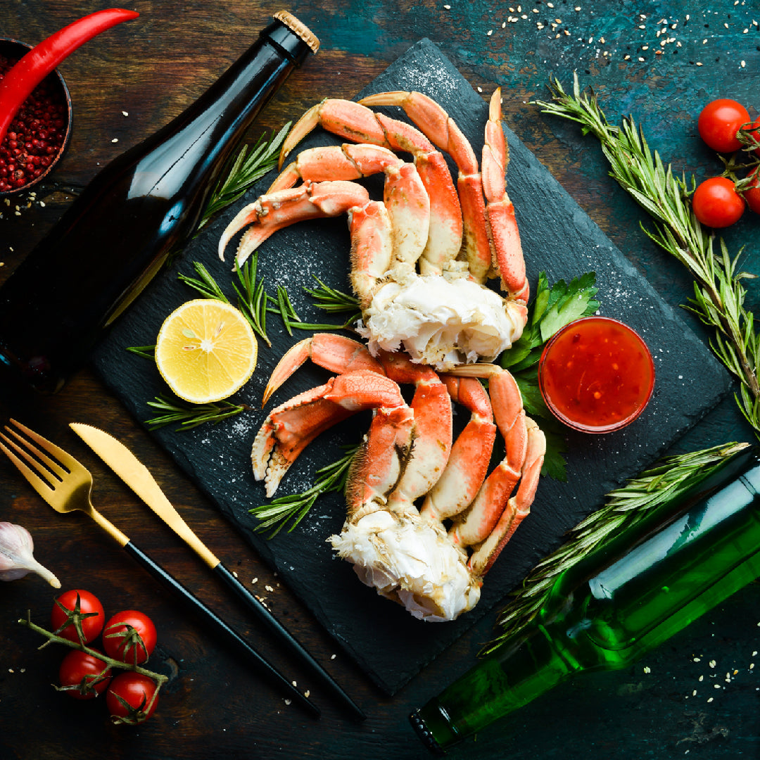 Fresh Alaskan King Crab claws on ice, ready for online delivery