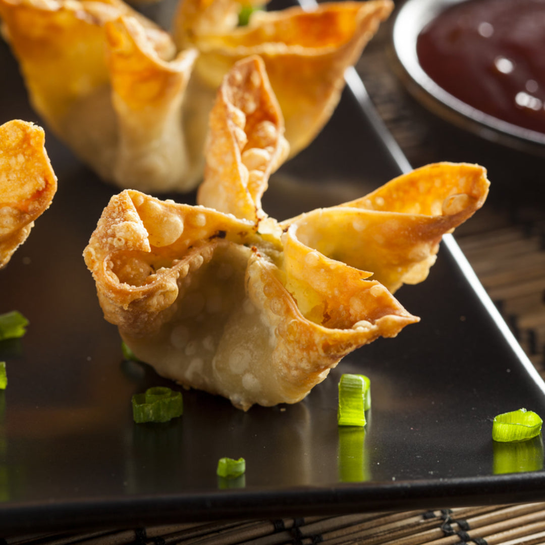 Crab Rangoon appetizer with crispy wonton shells and creamy filling