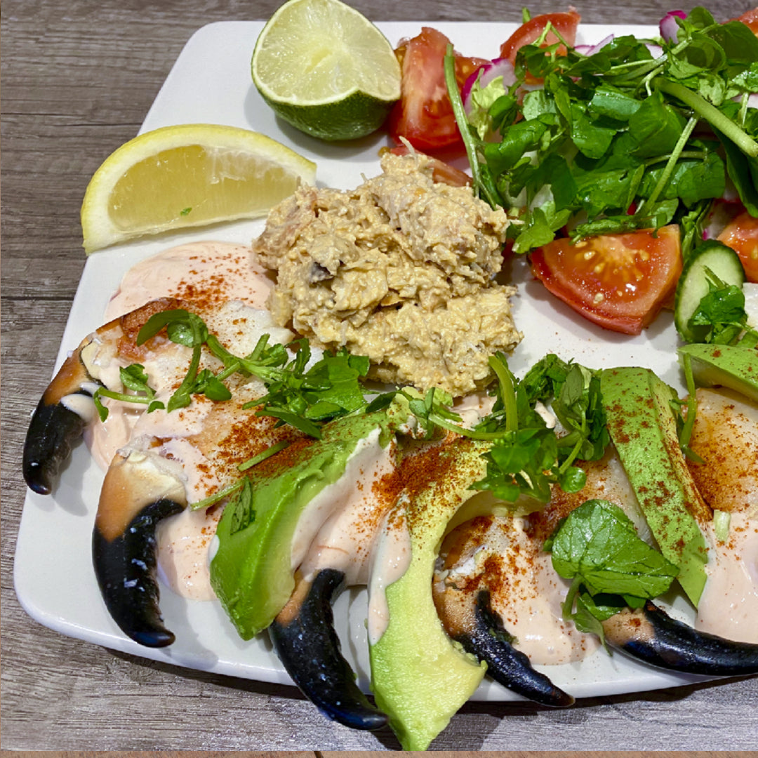 Fresh Dungeness crab and avocado salad with mixed greens and cherry tomatoes
