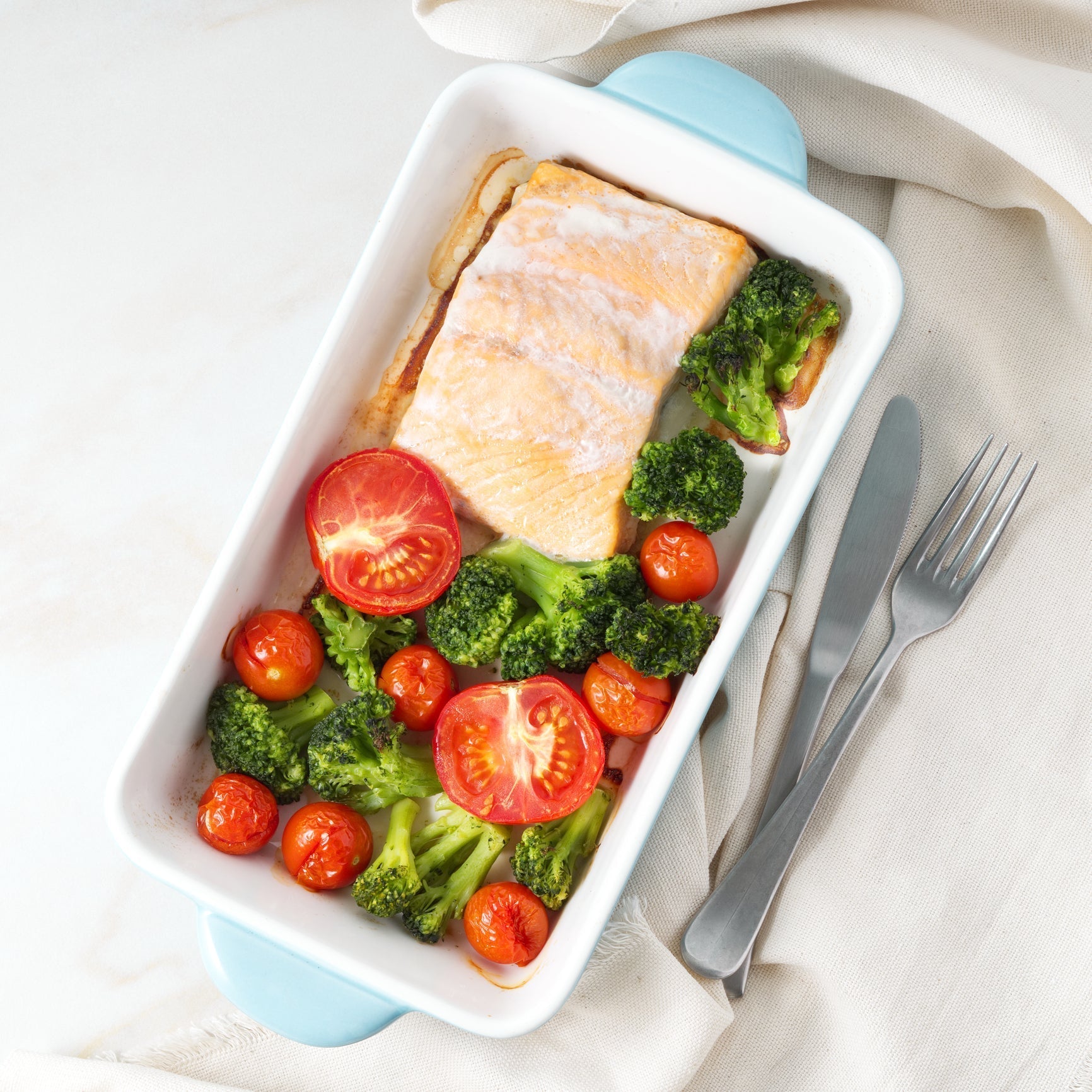 Ten salmon dishes including honey-garlic glazed salmon, miso-glazed sockeye, salmon poke bowl, and salmon en papillote