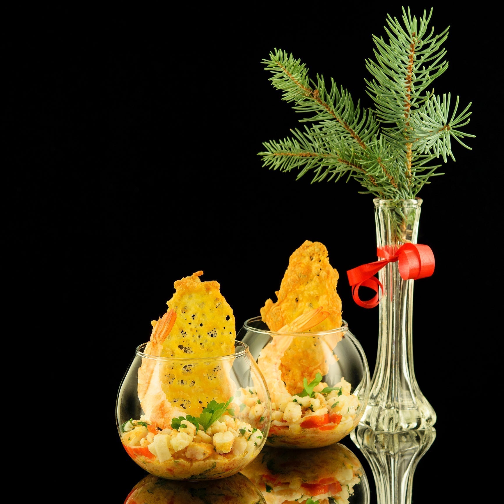 Elegant gourmet crab dishes for entertaining: crab thermidor, crab risotto, and grilled king crab legs with compound butter on a formal dinner table