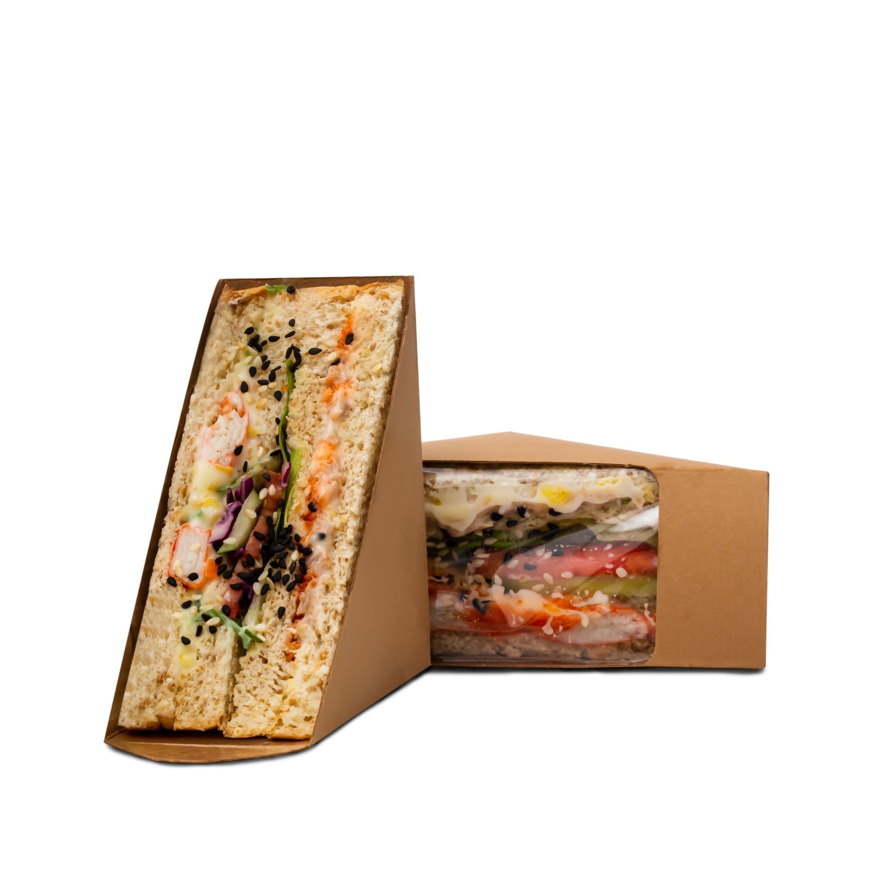 Gourmet crab meat sandwich on toasted brioche with lettuce, lemon aioli, and fresh chives