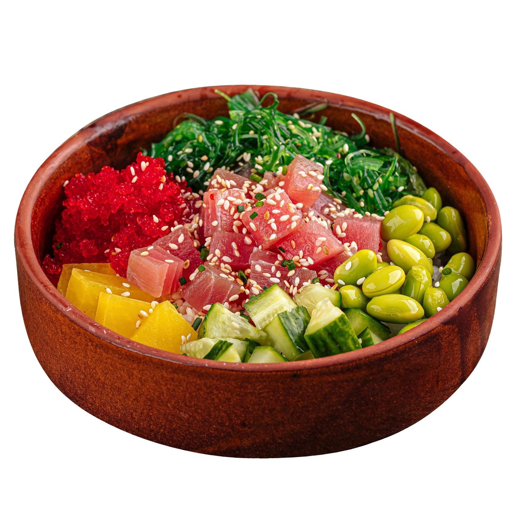 Bowl filled with freshly cut tuna and various ingredients for tartare preparation