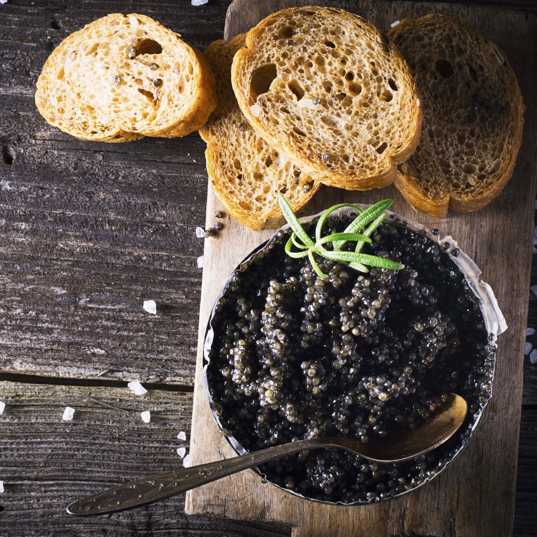Assorted premium black caviar varieties including Beluga, Ossetra, and Kaluga