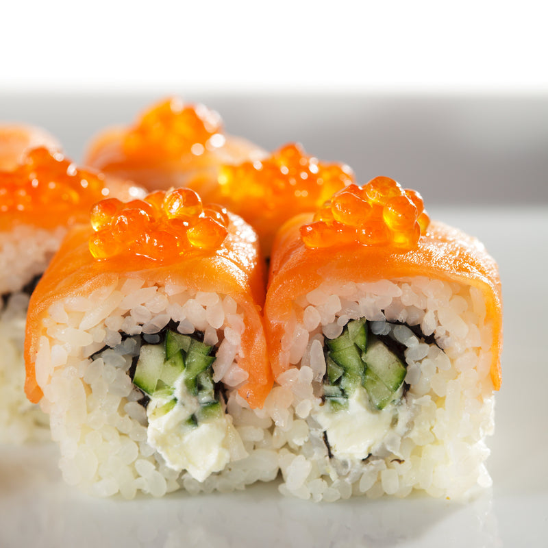 Bowl of fresh ikura salmon roe with vibrant orange eggs