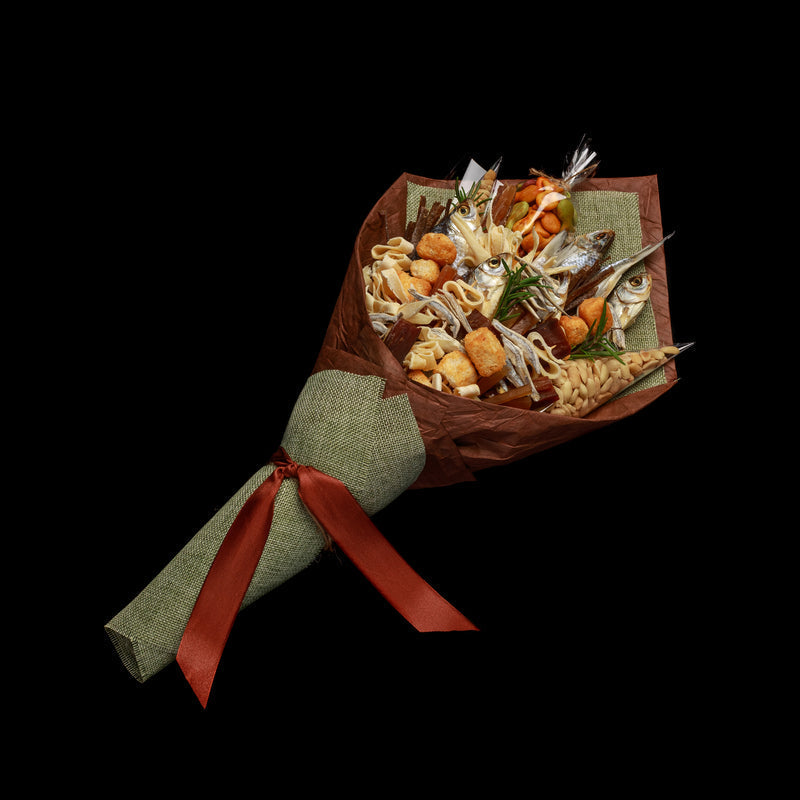 Assortment of healthy fish snacks including smoked salmon bites, crispy fish skin chips, and fish jerky on a wooden board