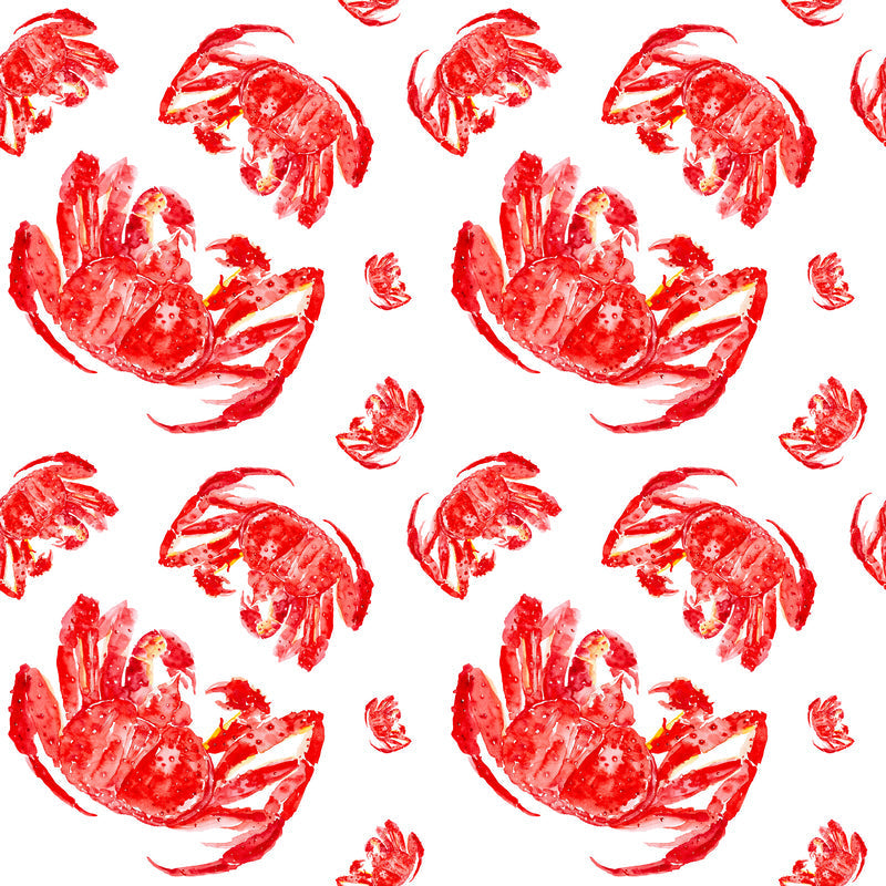 Massive Alaskan red king crab legs served on a platter with melted butter and lemon wedges