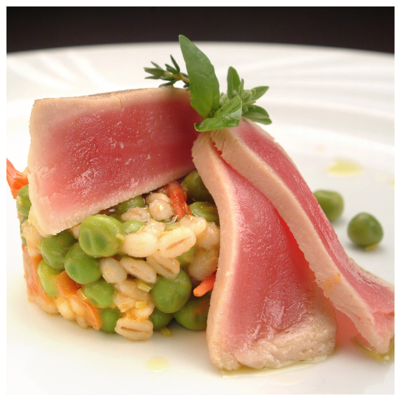 Assorted smoked tuna varieties including ahi, bluefin, and albacore