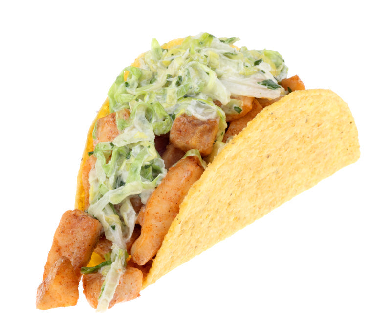 Colorful seafood tacos with halibut and salmon, topped with fresh salsa and lime