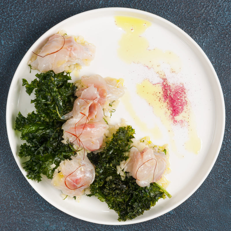 Lingcod fillet on a cutting board ready to cook
