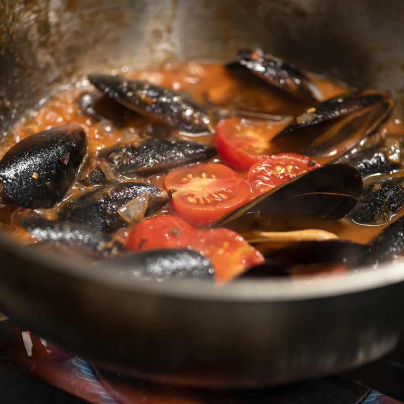 Freshly harvested mussels on a boat – the journey from sea to plate