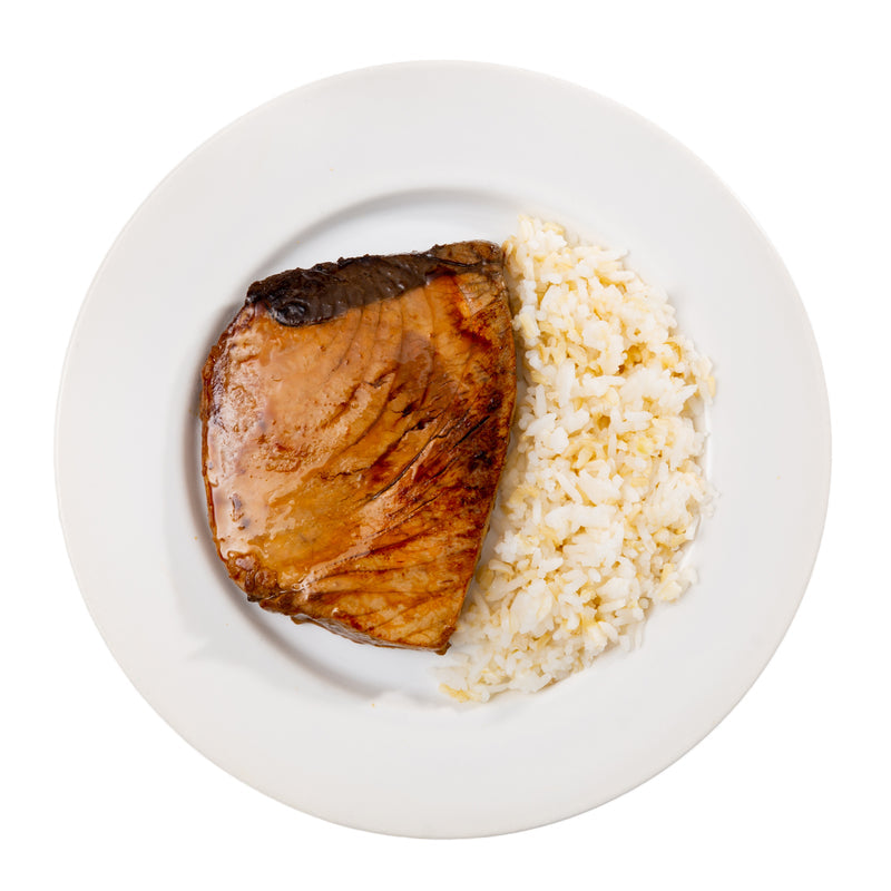 Ancient-style wooden smoking rack with whole tuna fillets being cold-smoked over applewood chips