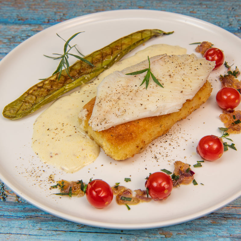 Fresh lingcod fillet showcasing its firm white flesh and mild flavor