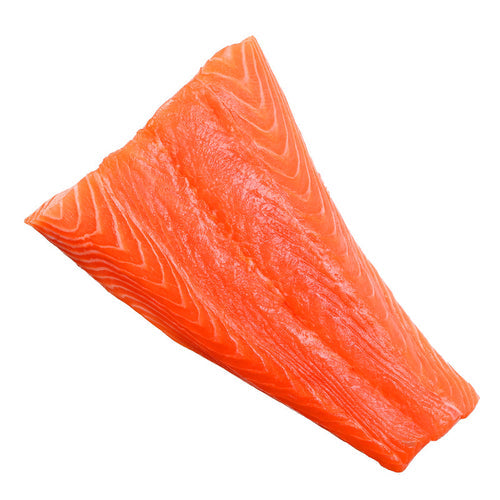 Bright red Kodiak sockeye salmon swimming upstream in a clear Alaskan river during spawning season