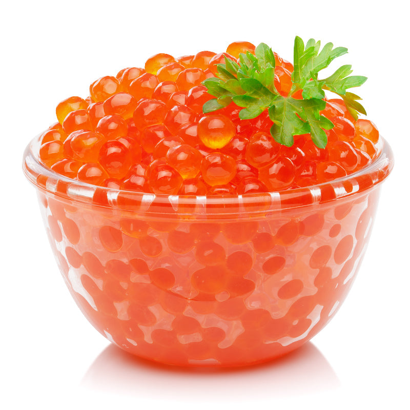 Vibrant orange ikura salmon roe pearls in a ceramic spoon beside soy sauce and fresh wasabi, highlighting omega-3 health benefits