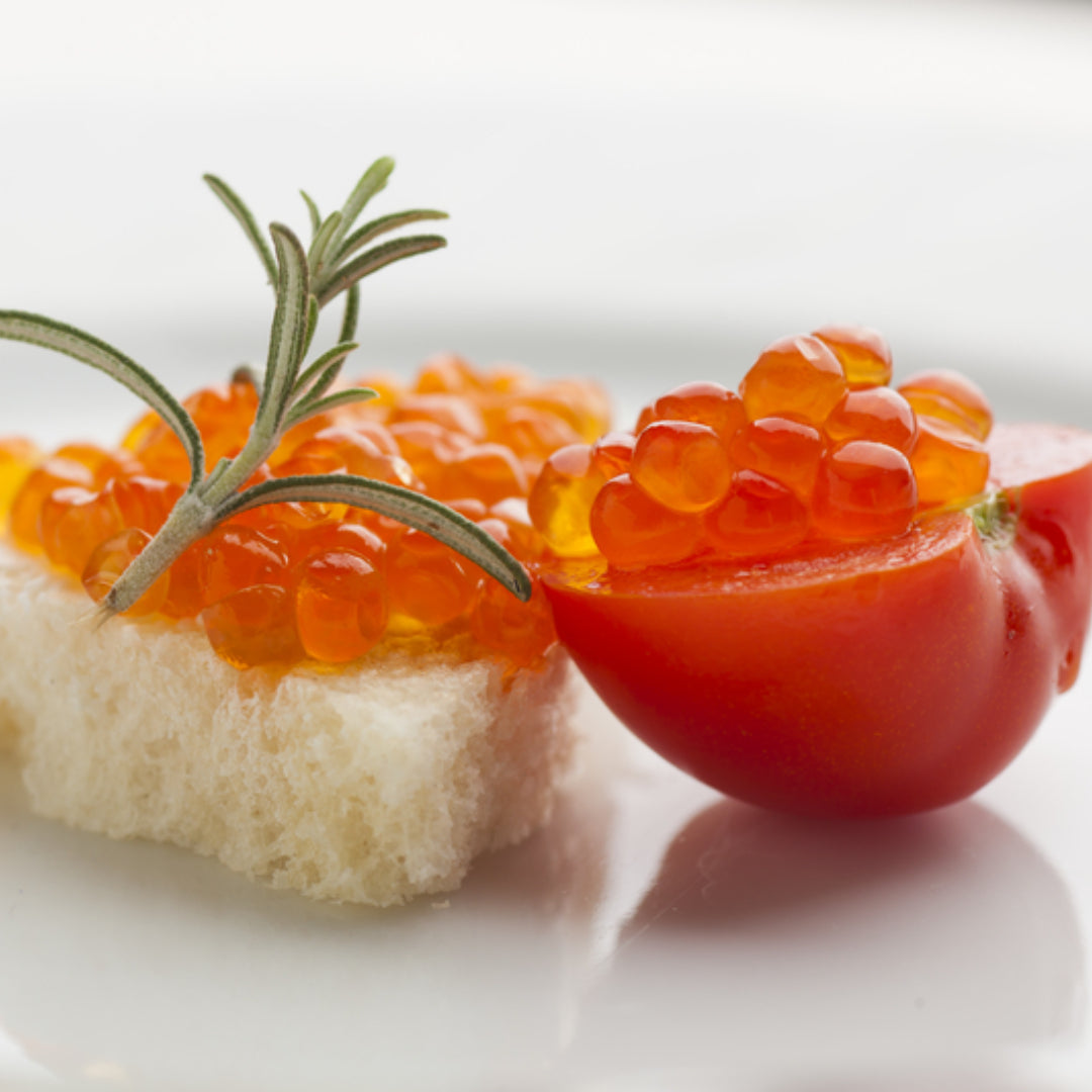 Salmon roe (ikura) served five ways: on sushi rice, blinis with crème fraîche, avocado toast, pasta, and a Nordic open-faced sandwich