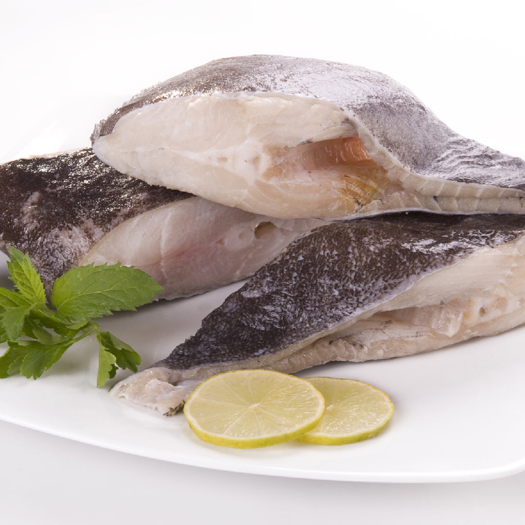 Fresh Pacific halibut fillet on ice with storage tips for keeping seafood fresh longer