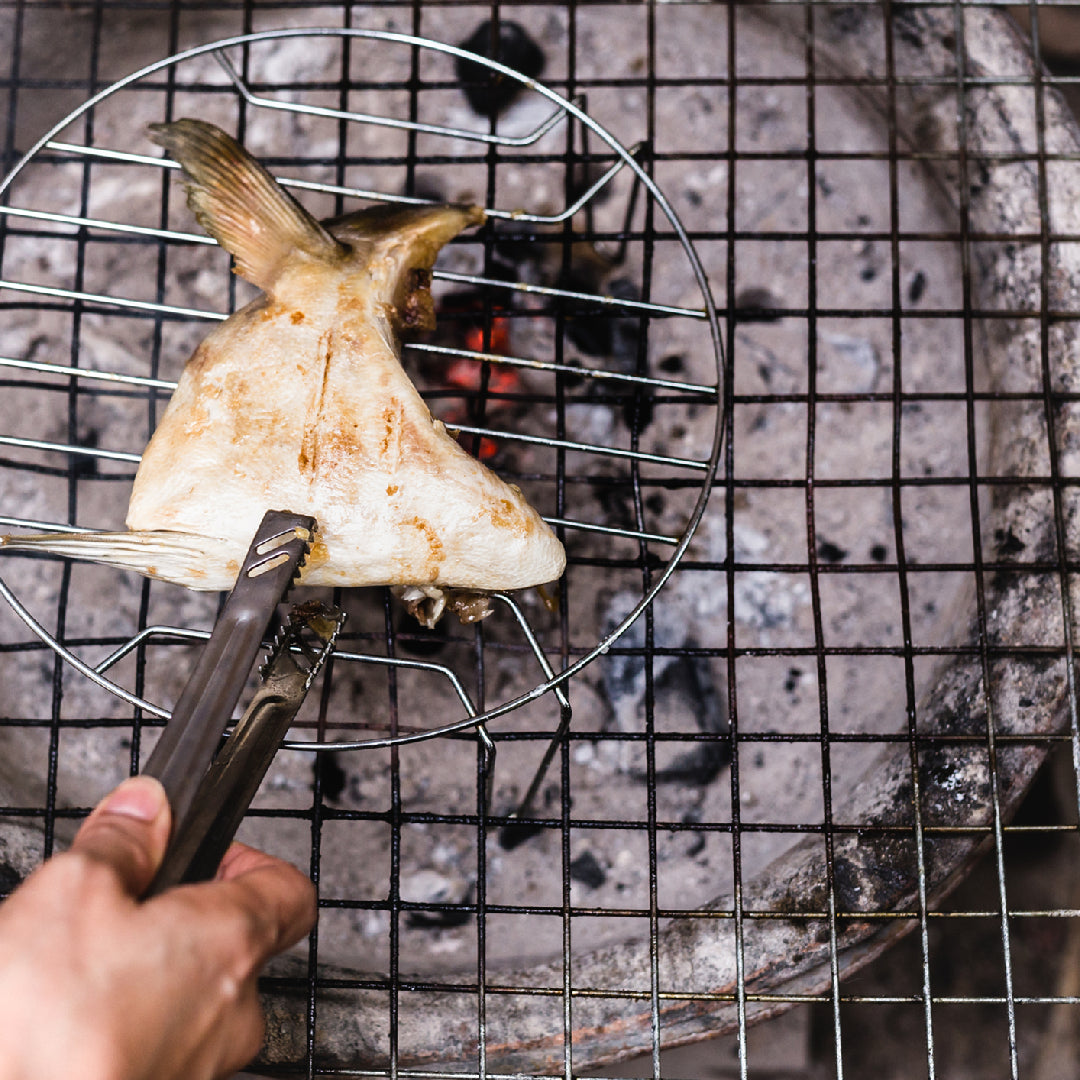 Five elegant Hamachi appetizers including sashimi with ponzu, grilled collar, ceviche, tartare, and smoked bites on a serving platter