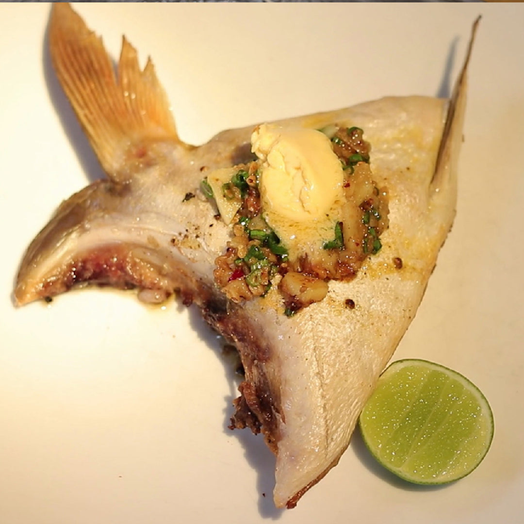 Fresh Hamachi fish wrapped in plastic and stored on ice in a refrigerator for maximum freshness