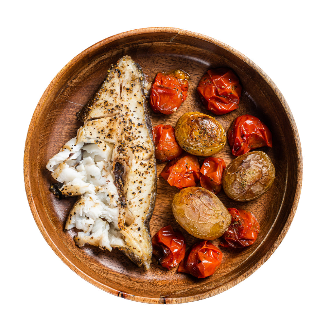 Five plated halibut dishes showcasing global recipes including miso-glazed, Mediterranean grilled, Thai curry, Italian pan-seared, and Mexican taco preparations