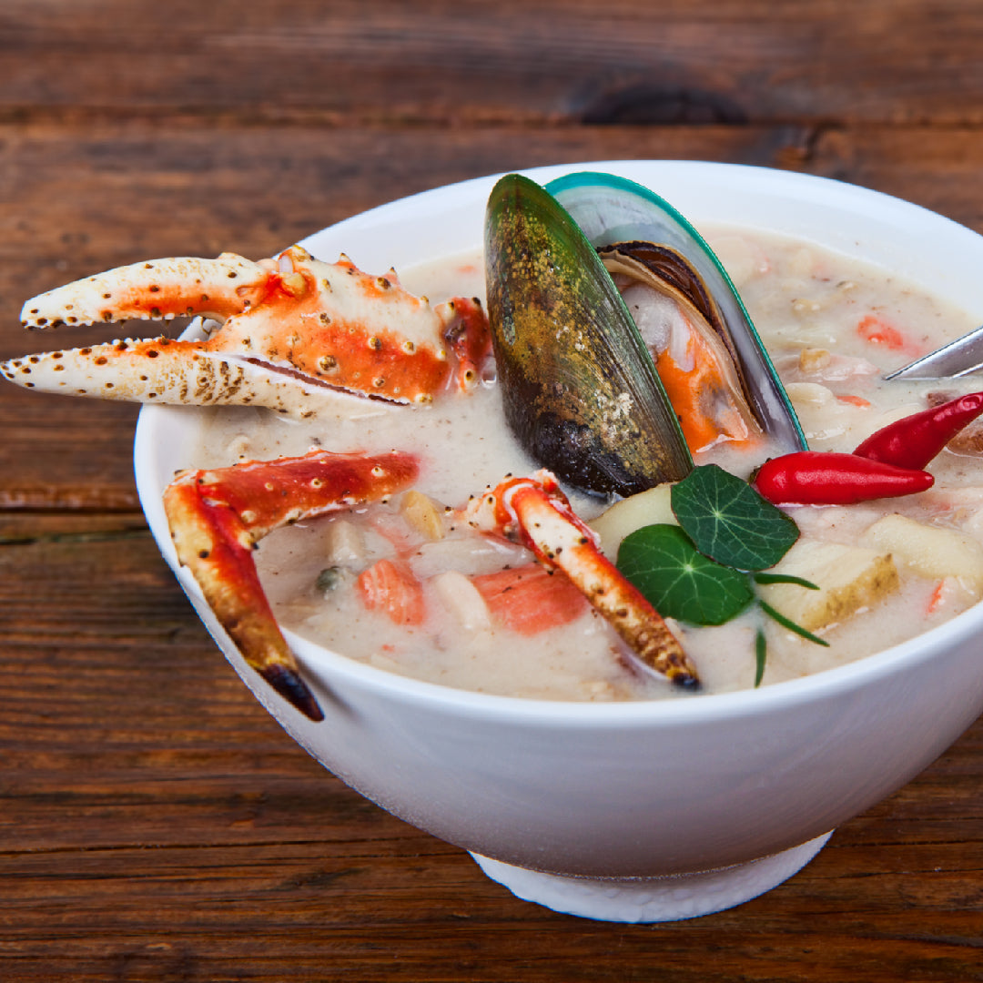 Fresh king crab legs on a plate showcasing their rich color and premium quality