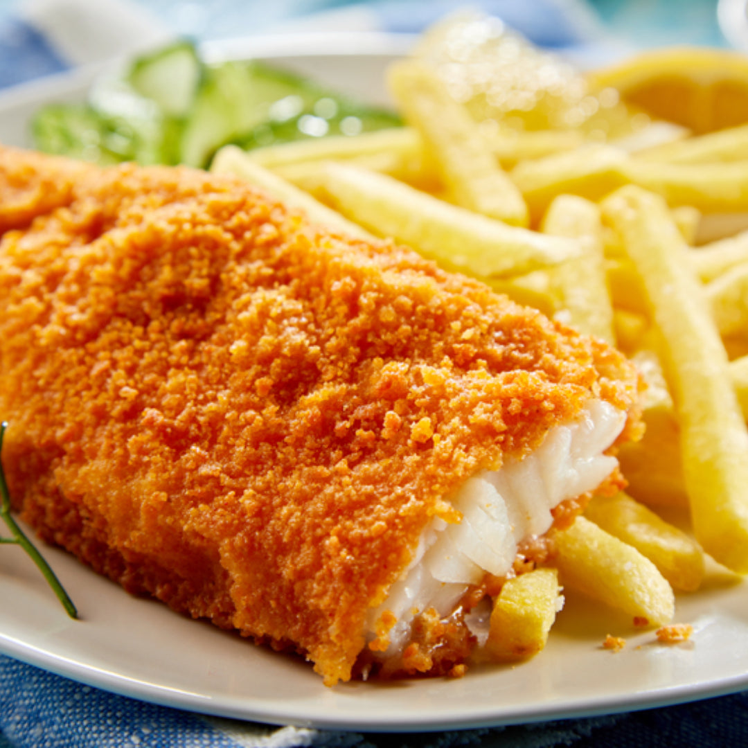 Fresh Alaskan pollock fillets on ice at a sustainable seafood market