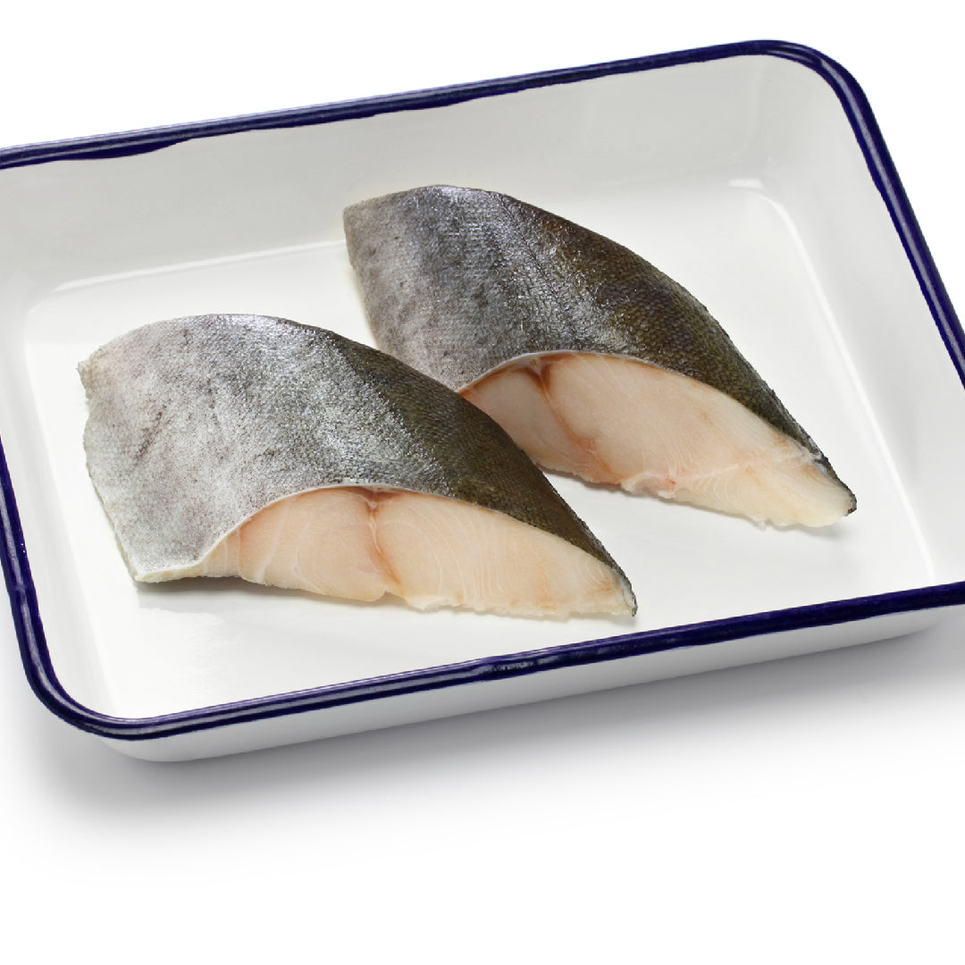 Exquisite sablefish (black cod) prepared in a gourmet style, showcasing its flaky, buttery texture and rich flavor, served as the centerpiece in an elegant culinary setting