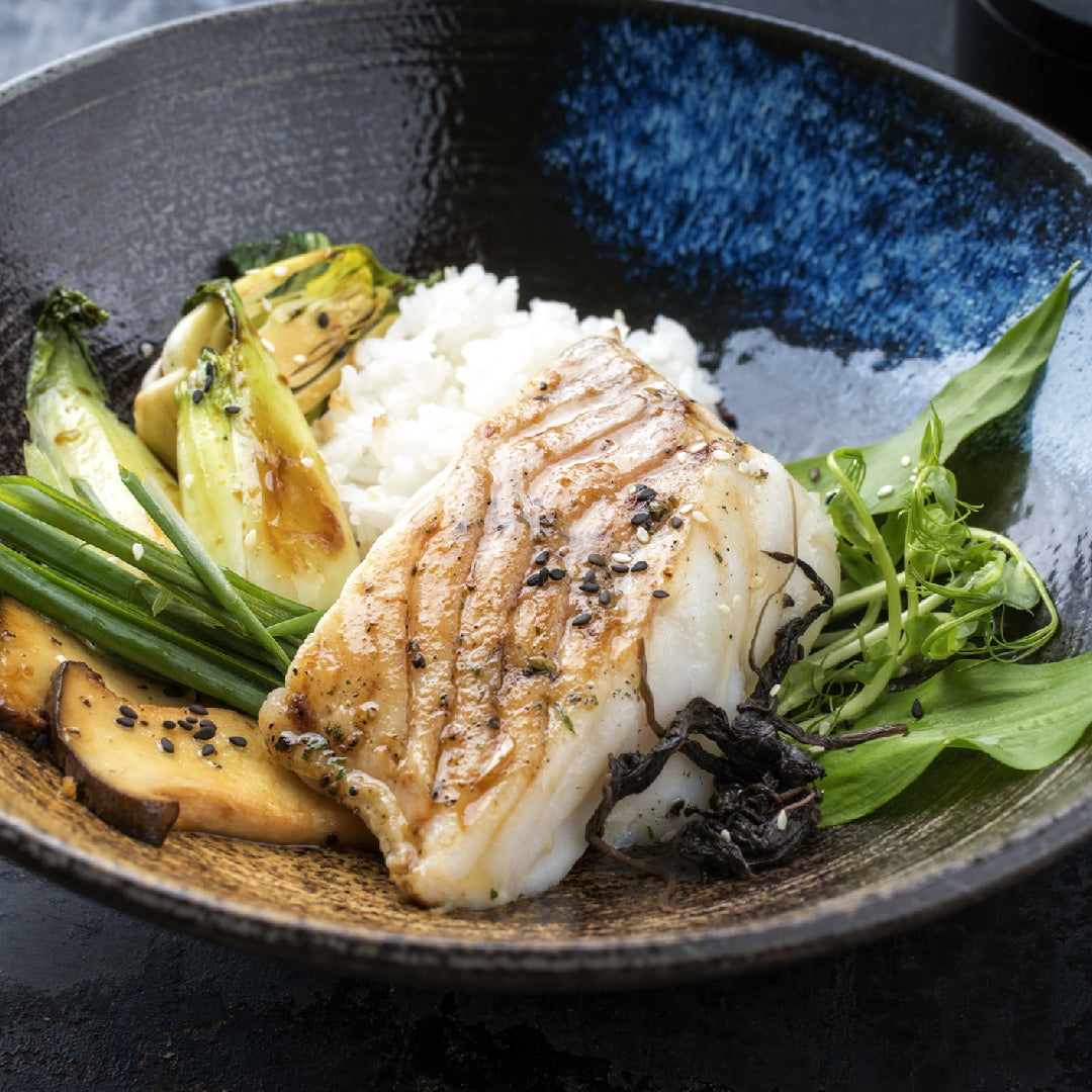 Pan-seared sablefish fillet with garlic butter and lemon, plated elegantly for a quick weeknight dinner