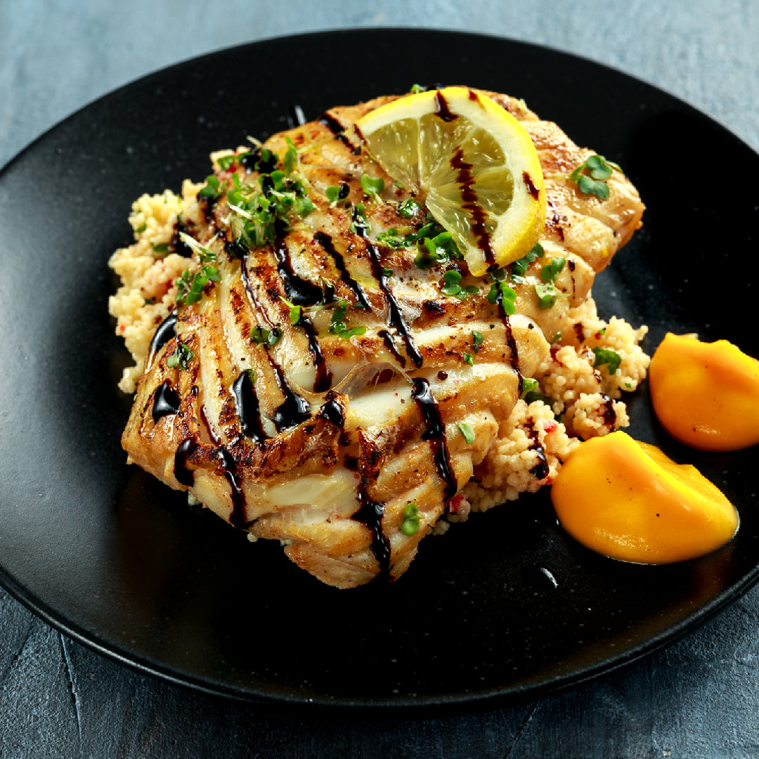 Fresh sablefish fillets displayed on ice, showcasing their rich, buttery texture and premium quality