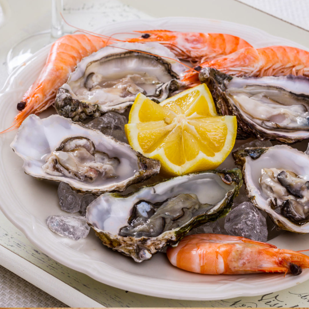 Beginner's guide to seafood: shrimp, oysters, and fresh seafood on a platter