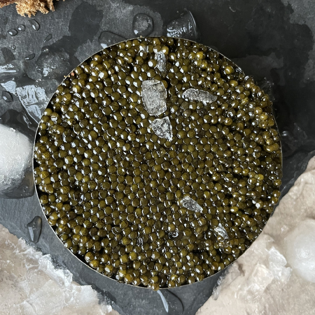 Ossetra caviar served with foie gras, crème fraîche and brioche