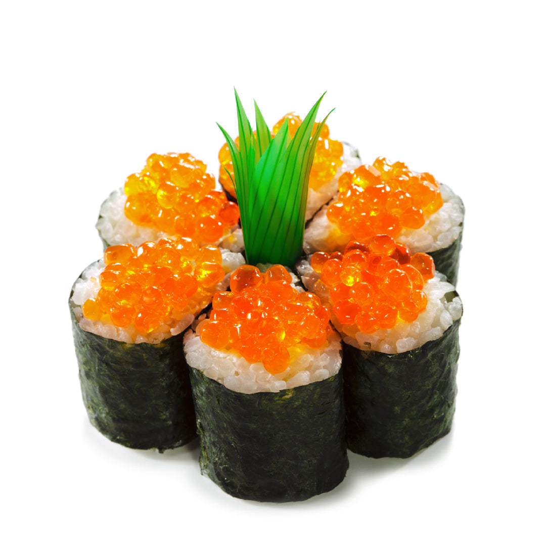 Ikura udon in a ceramic bowl: thick chewy noodles in golden dashi broth topped with vibrant orange salmon roe, nori strips, sliced green onions, and sesame seeds