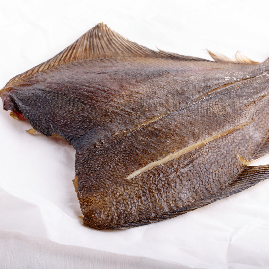 Petrale sole fillets being vacuum-sealed in bags for freezer storage to preserve freshness