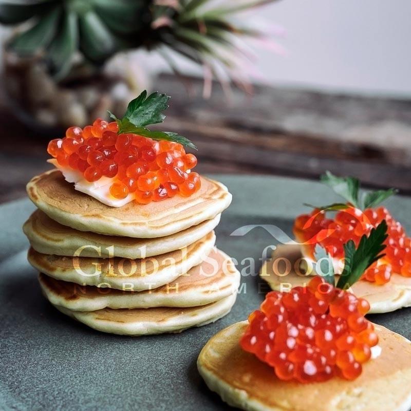 Red caviar and salmon roe with bright orange ikura pearls