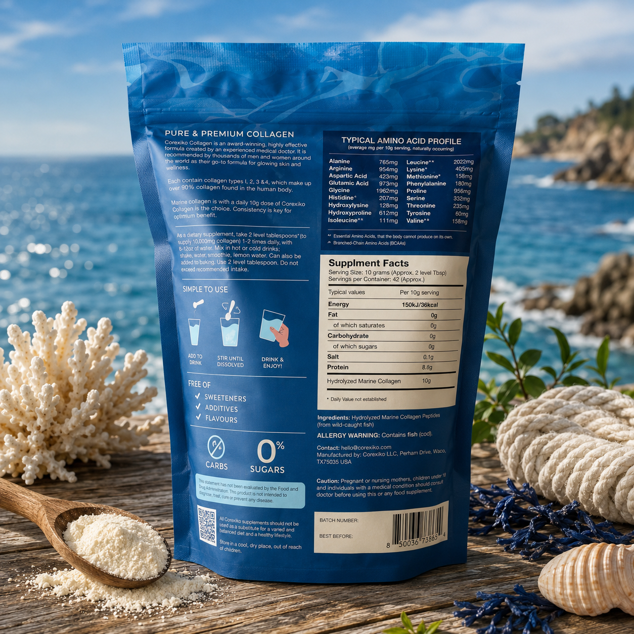 A blue stand-up pouch of collagen powder shown outdoors on a wooden surface with sea glass, coral, rope, and ocean water in the background. The back of the pouch is visible, showing supplement facts, usage icons, and claims.