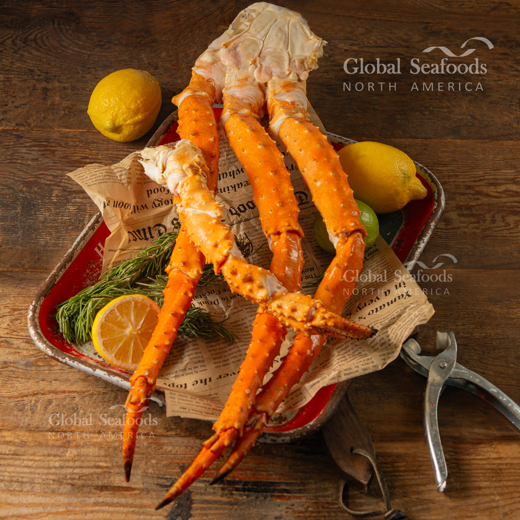 Golden king crab sections in a metal tray