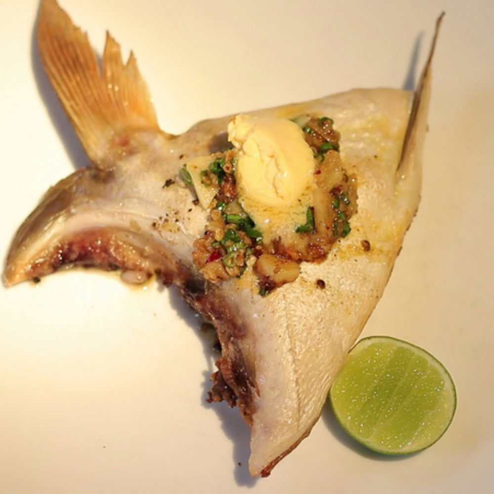 Hot smoked Hamachi (Yellowtail) collar with crispy edges and rich golden color, served ready for plating or tasting