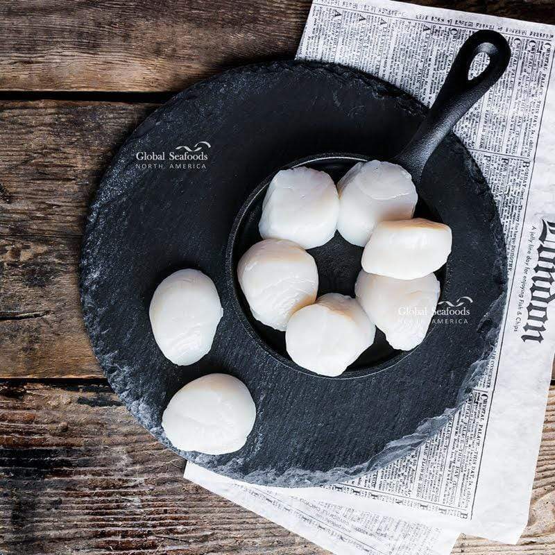 Jumbo sea scallops in a cast-iron pan