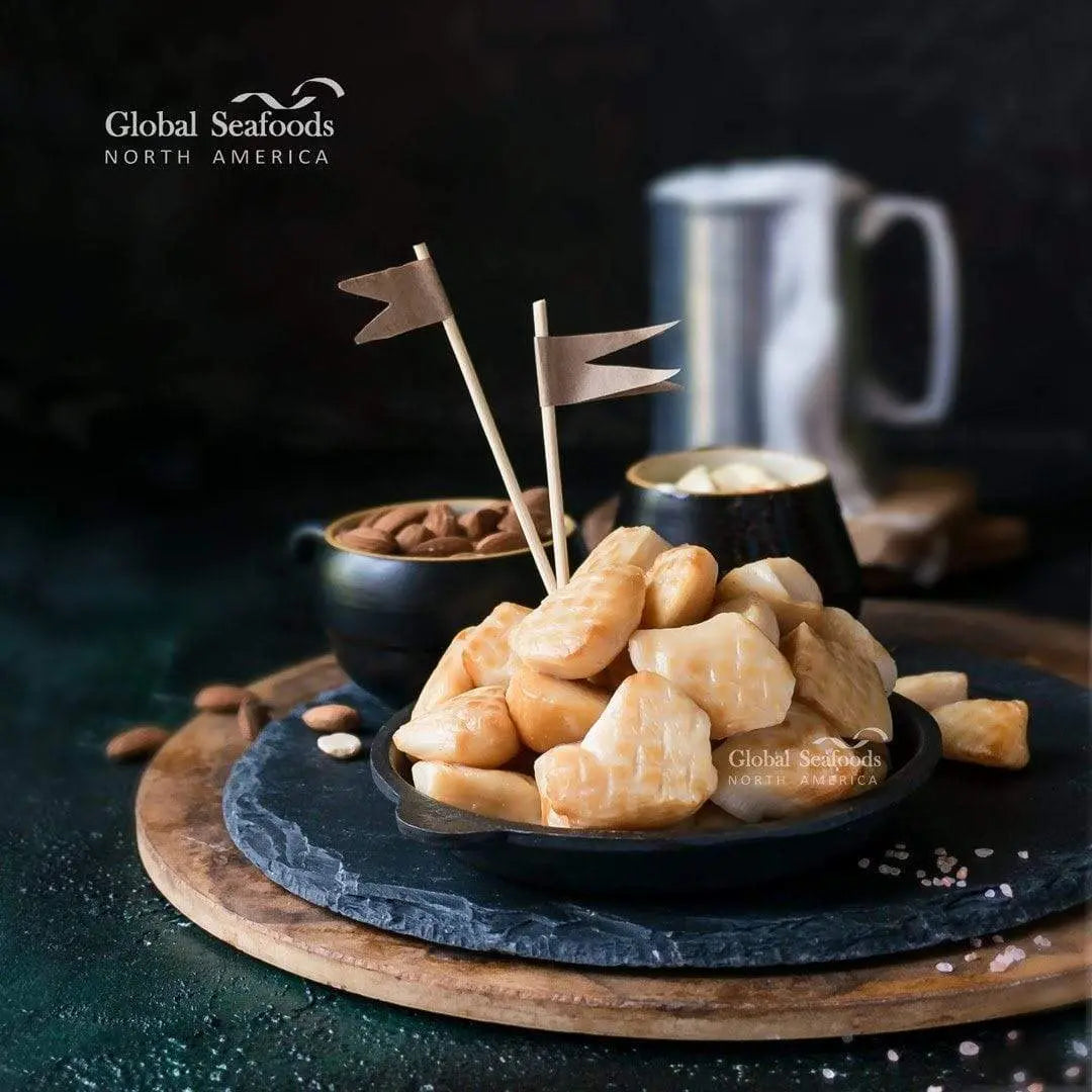 Smoked scallops in a cast-iron pan