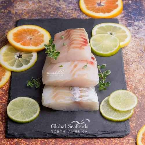 Wild-caught Pacific cod fillets individually vacuum-packed, showcasing firm, flaky whitefish portions from the Pacific Ocean